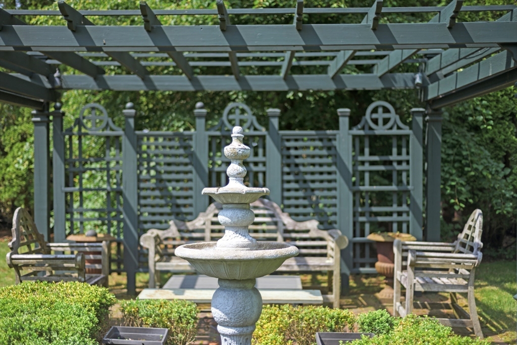 51 Cliff Street Nahant, MA 01908 - Photo 33 of 42 a view of a chairs and table in a patio