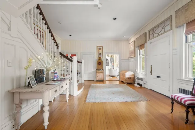 a view of a living room and dining room