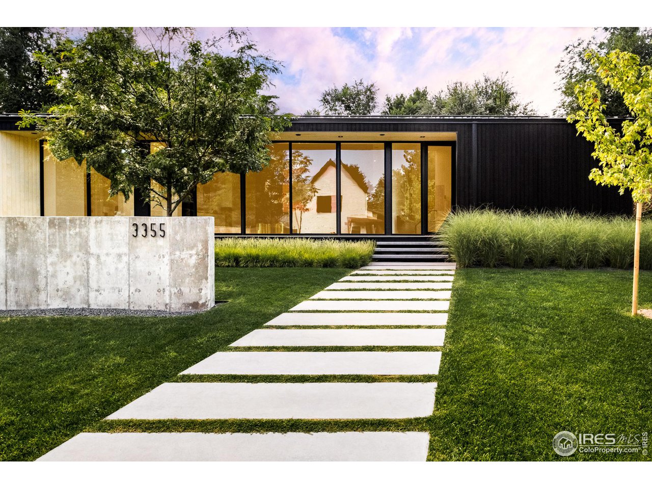 3355 Vista Drive Boulder, CO 80304 - Photo 1 of 40 a front view of a house with garden