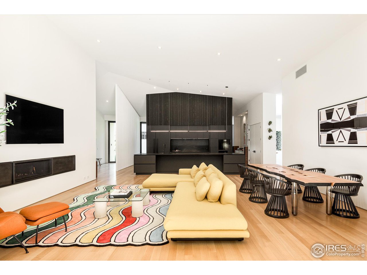 3355 Vista Drive Boulder, CO 80304 - Photo 13 of 40 a living room with furniture and a flat screen tv