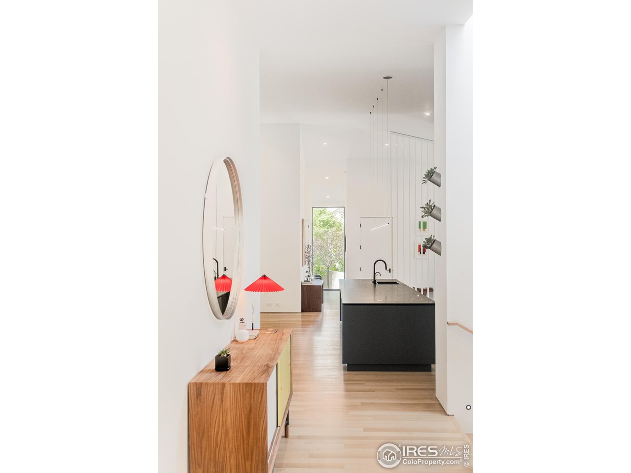 3355 Vista Drive Boulder, CO 80304 - Photo 16 of 40 a living room with furniture and wooden floor