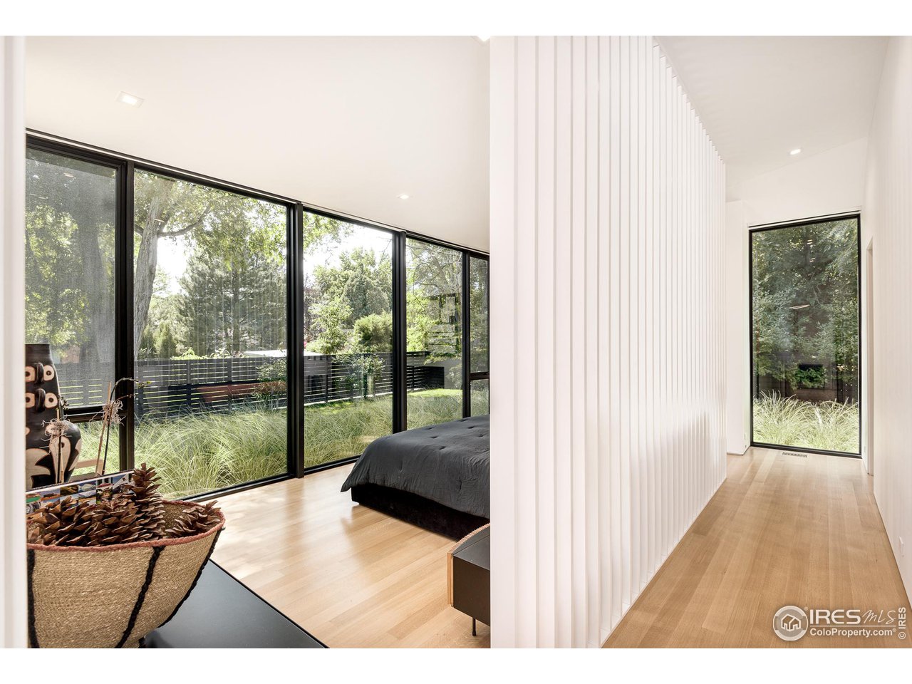 3355 Vista Drive Boulder, CO 80304 - Photo 19 of 40 a living room with a large window and a table