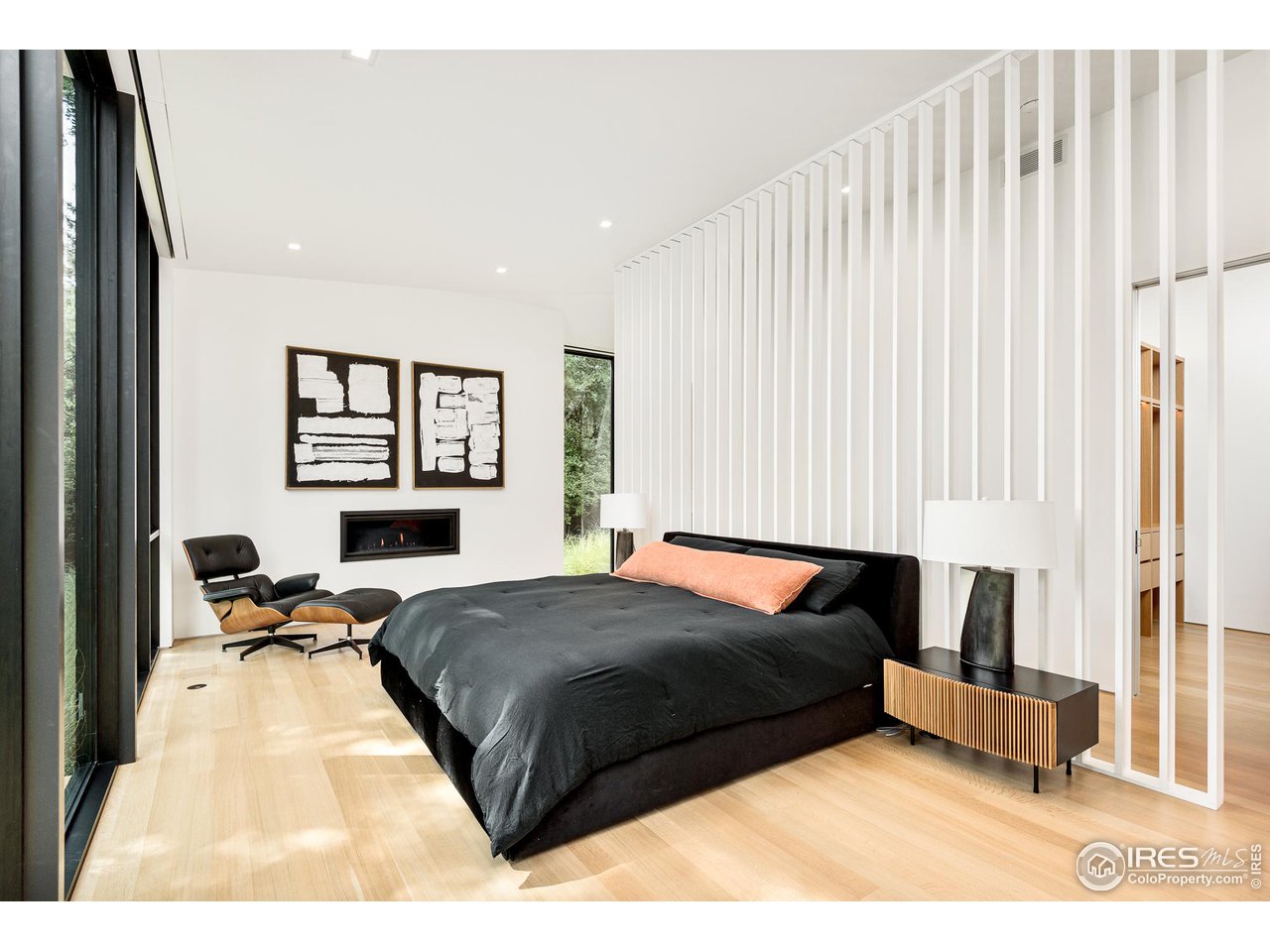 3355 Vista Drive Boulder, CO 80304 - Photo 20 of 40 a bedroom with a bed window and wall painting