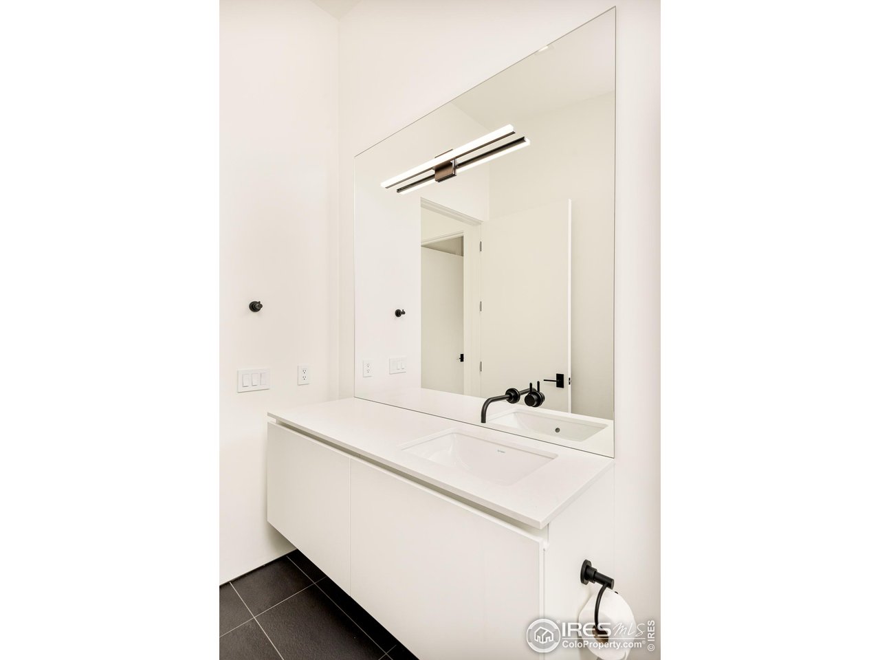 3355 Vista Drive Boulder, CO 80304 - Photo 27 of 40 a bathroom with a sink and a mirror