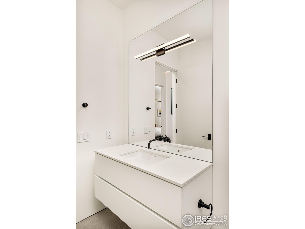 3355 Vista Drive Boulder, CO 80304 - Photo 35 of 40 a bathroom with a sink and a mirror