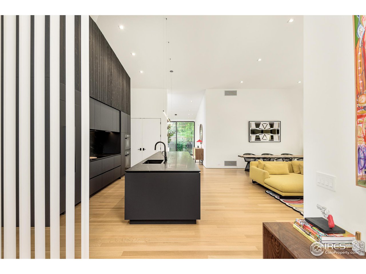 3355 Vista Drive Boulder, CO 80304 - Photo 7 of 40 a living room with furniture and a flat screen tv