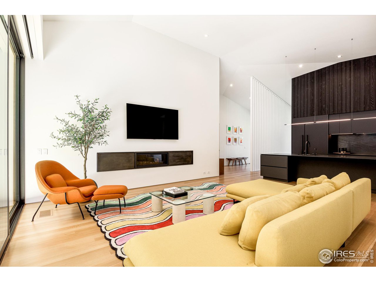 3355 Vista Drive Boulder, CO 80304 - Photo 10 of 40 a living room with furniture and a flat screen tv