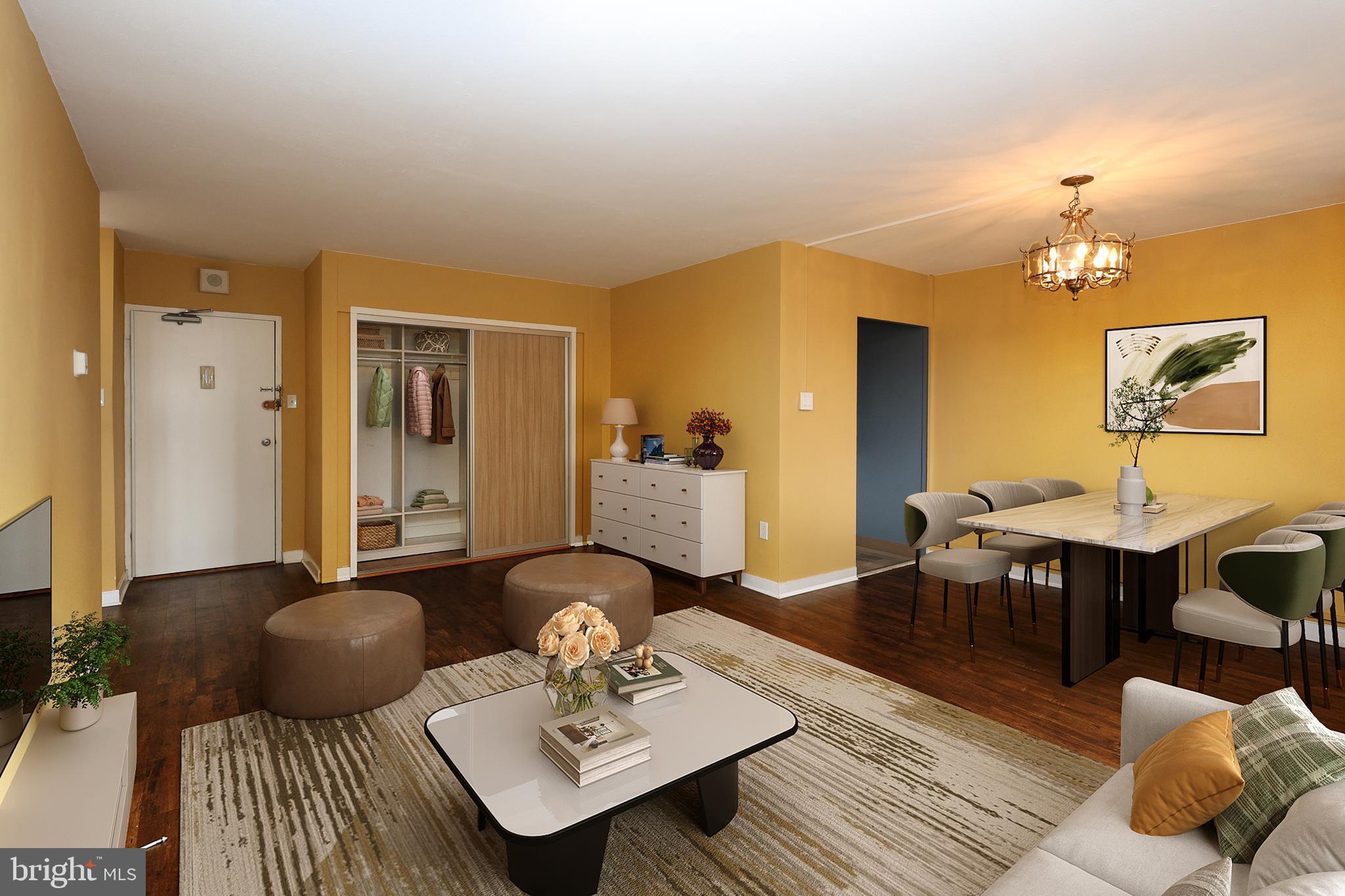 118 South 21st Street, Unit 1308 Philadelphia, PA 19103 - Photo 3 of 15 a living room with furniture and wooden floor