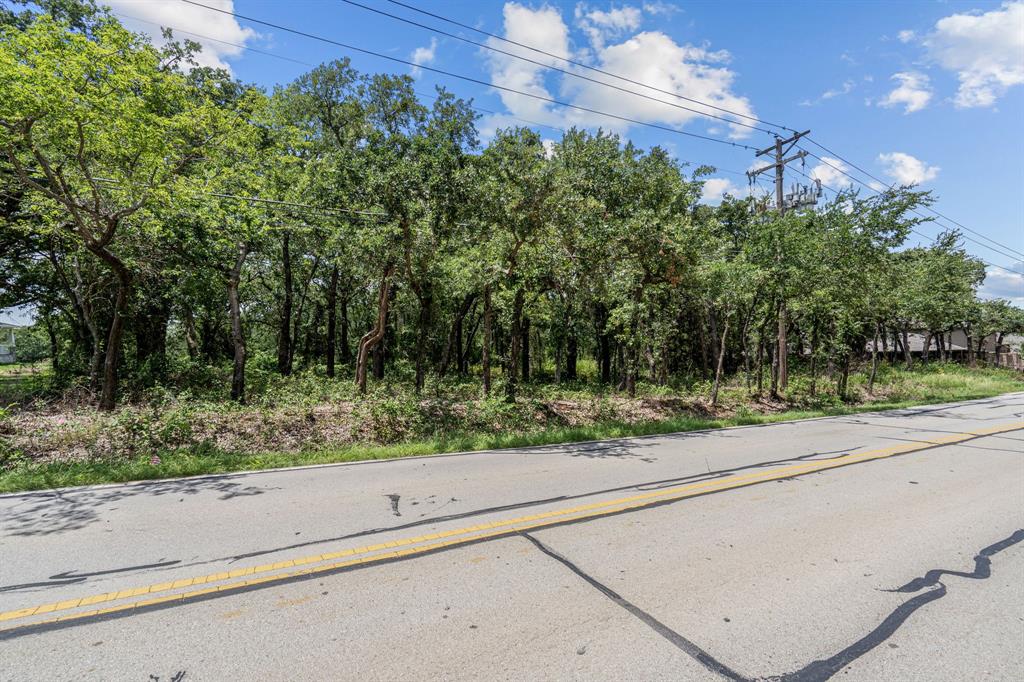 1963 Callender Road Mansfield, TX 76063 - Photo 15 of 19 a view of a yard and a car park side of the road