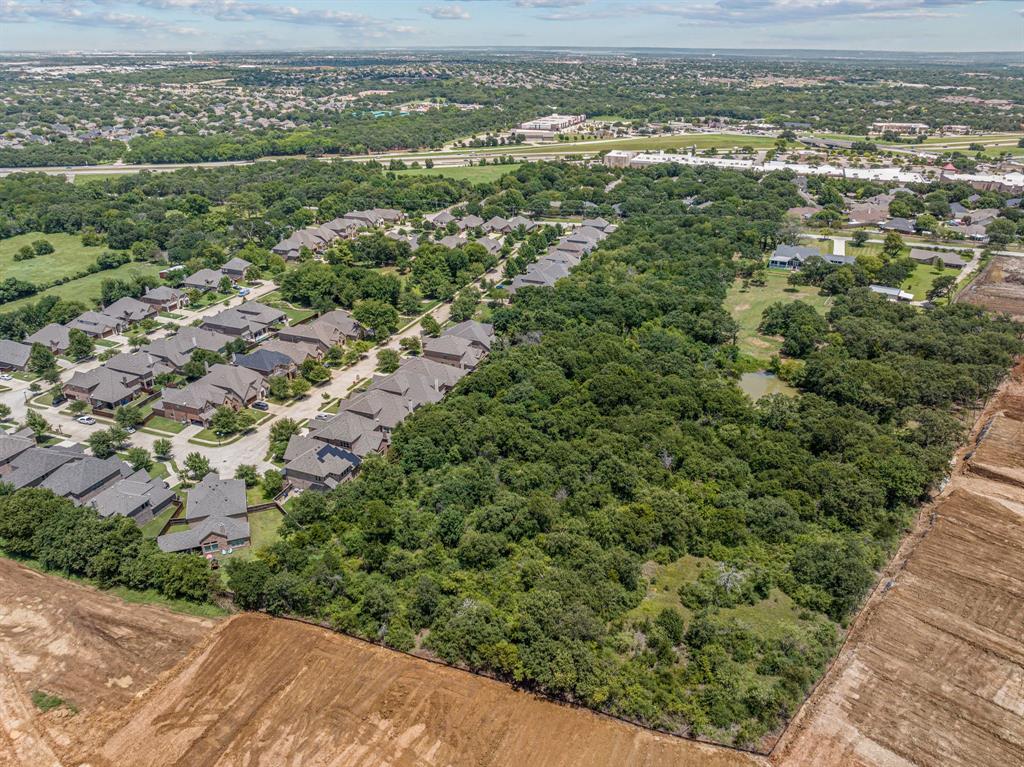 1963 Callender Road Mansfield, TX 76063 - Photo 8 of 19 an aerial view of residential houses with outdoor space and trees