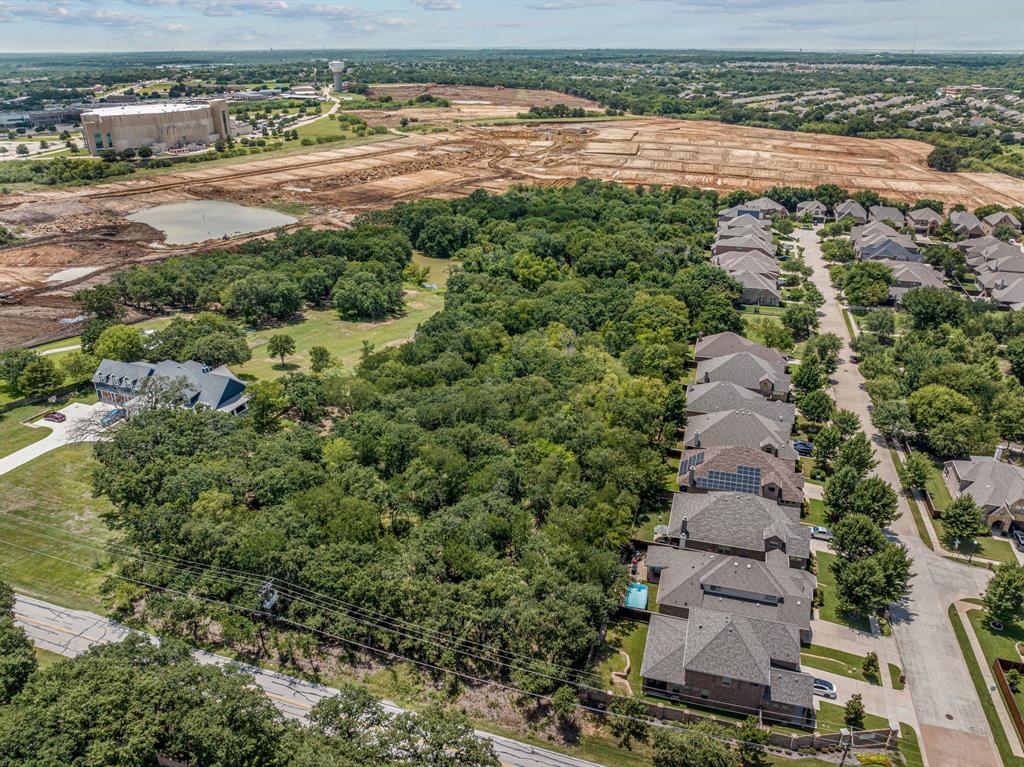 1963 Callender Road Mansfield, TX 76063 - Photo 10 of 19 a view of a yard with a lake