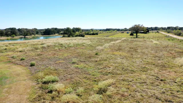 a view of a lake with a city