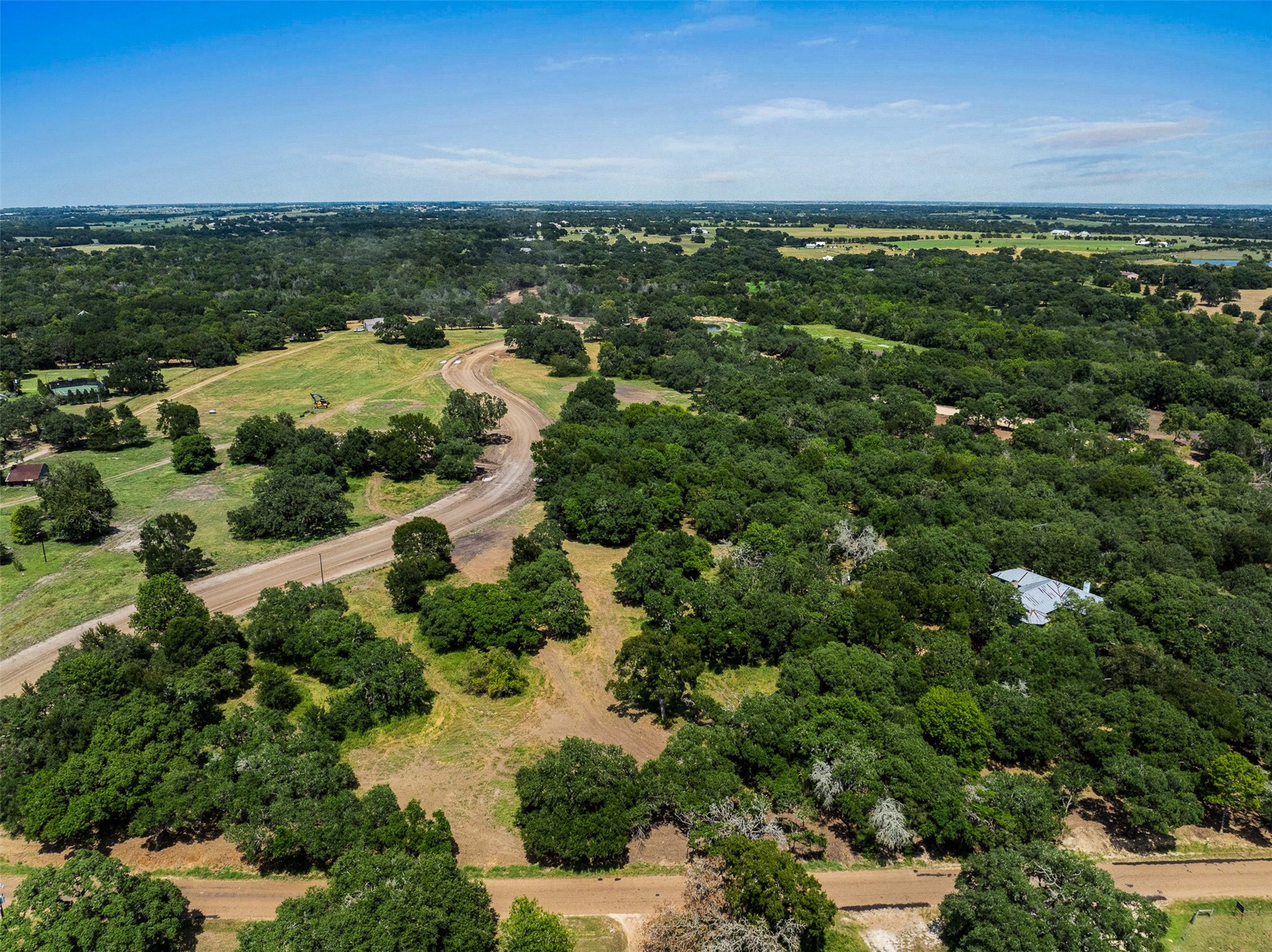 Tbd Tbd Wendy Lane Round Top, TX 78954 - Photo 7 of 8 an aerial view of residential houses with outdoor space and trees