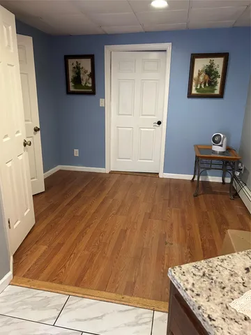 a view of a balcony with chairs