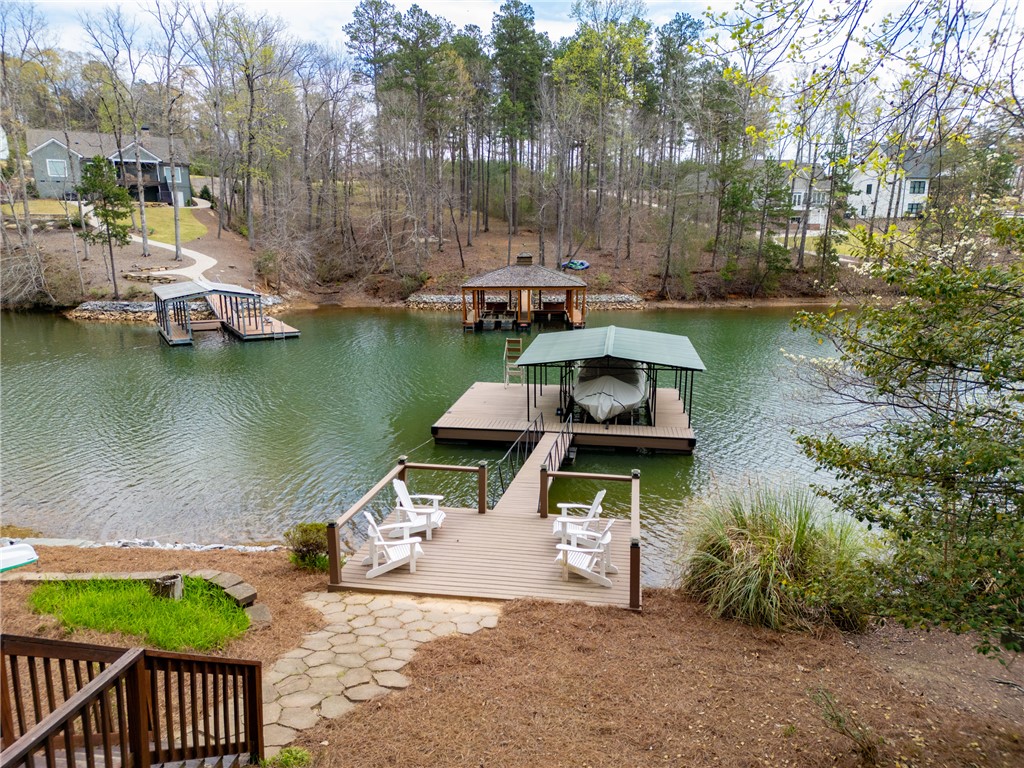 203 Little Lane Seneca, SC 29672 - Photo 47 of 48 This serene lakeside property boasts a private dock and mature trees.