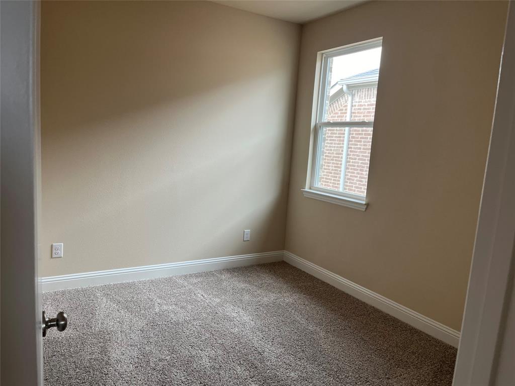 1013 Amendun Lane Anna, TX 75409 - Photo 16 of 19 an empty room with windows