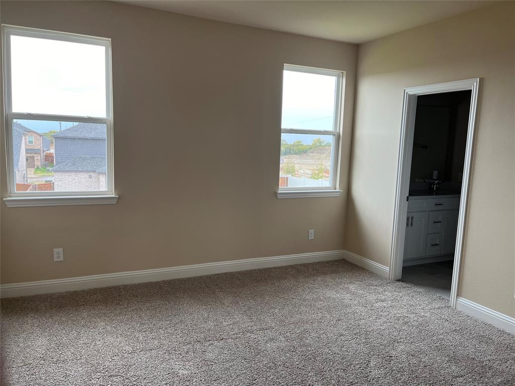 1013 Amendun Lane Anna, TX 75409 - Photo 9 of 19 an empty room with a window