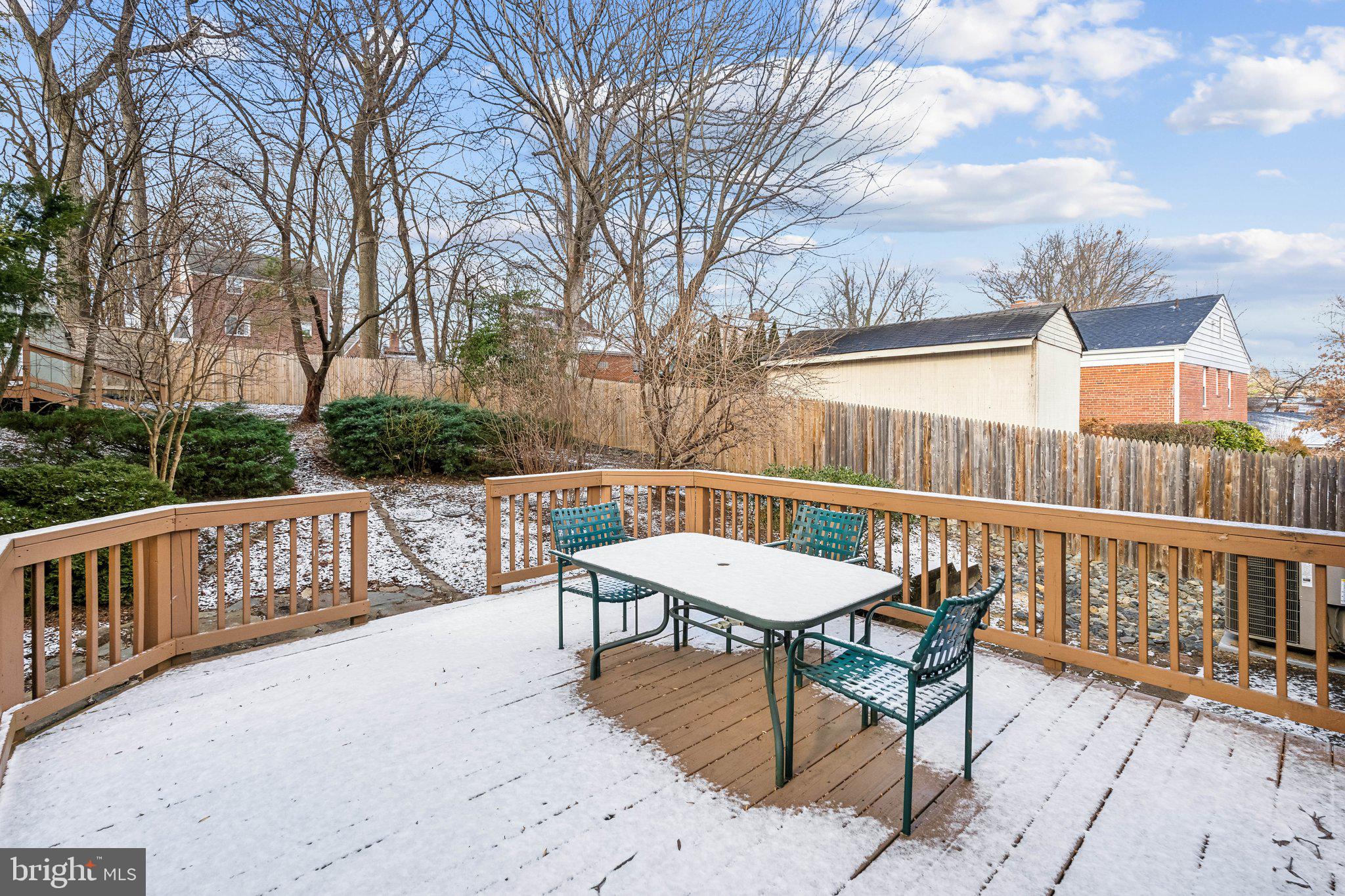 9016 Walden Road Silver Spring, MD 20901 - Photo 32 of 59 a view of a chairs and table in the patio