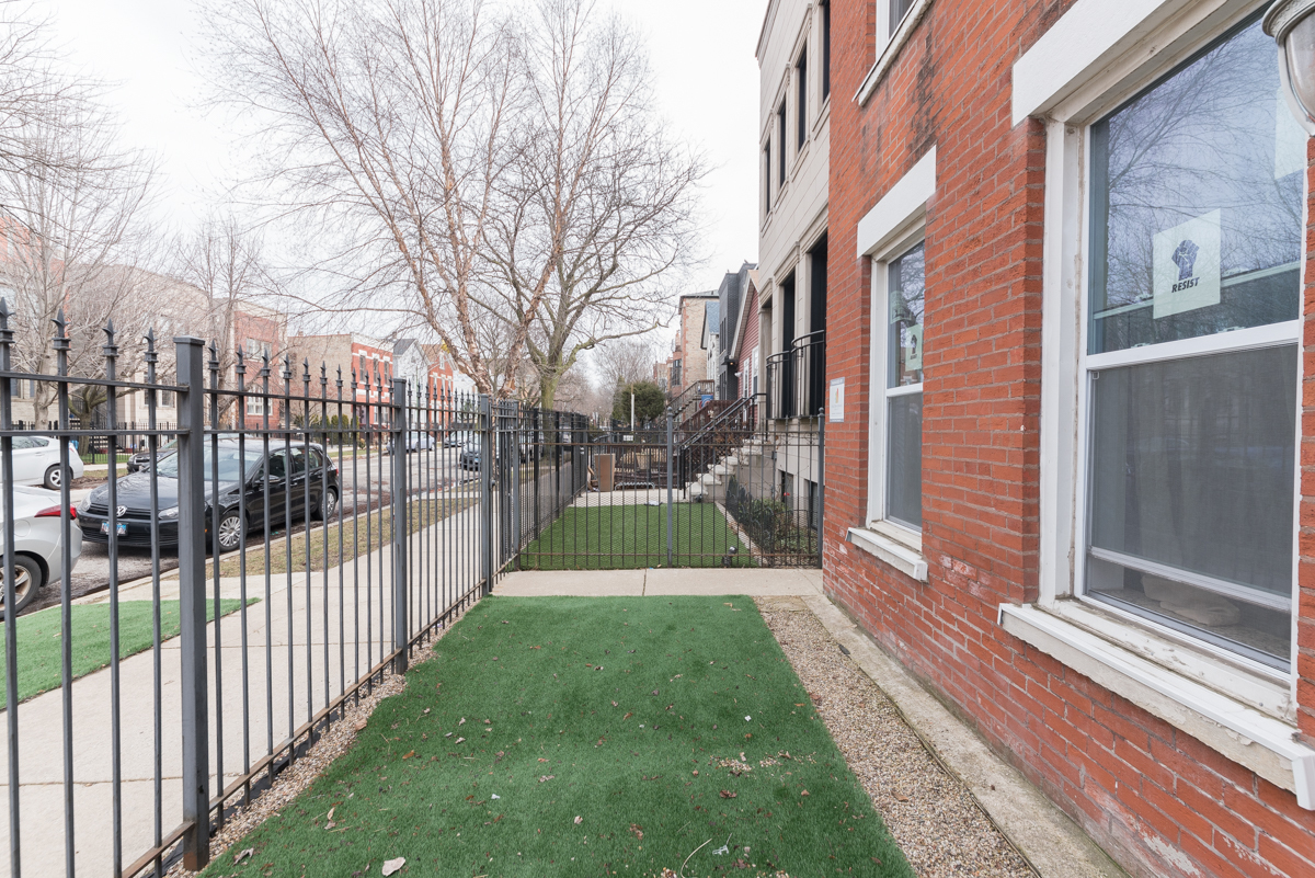 2139 West Huron Street, Unit 1F Chicago, IL 60612 - Photo 2 of 12 a view of a yard with a house