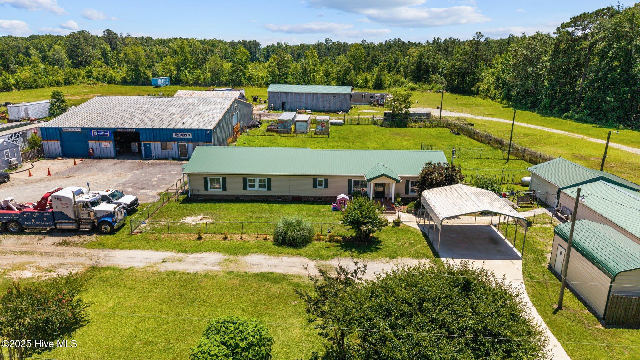 shop, house, carport, shed, workshop, metal storage building