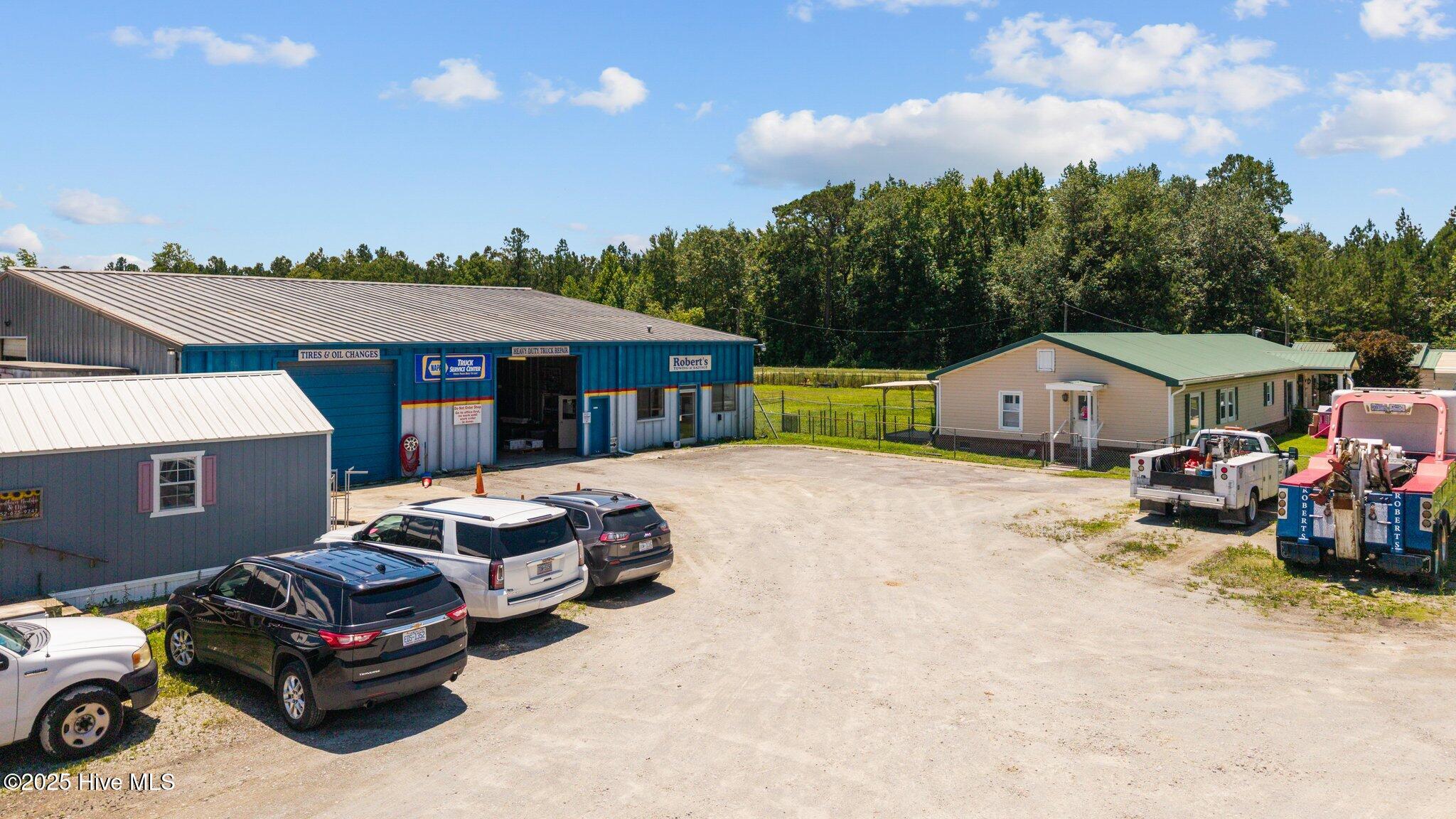 1831 Clarks Road New Bern, NC 28562 - Photo 3 of 82 parking lot, shop + house