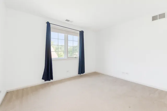 a view of a room with a window