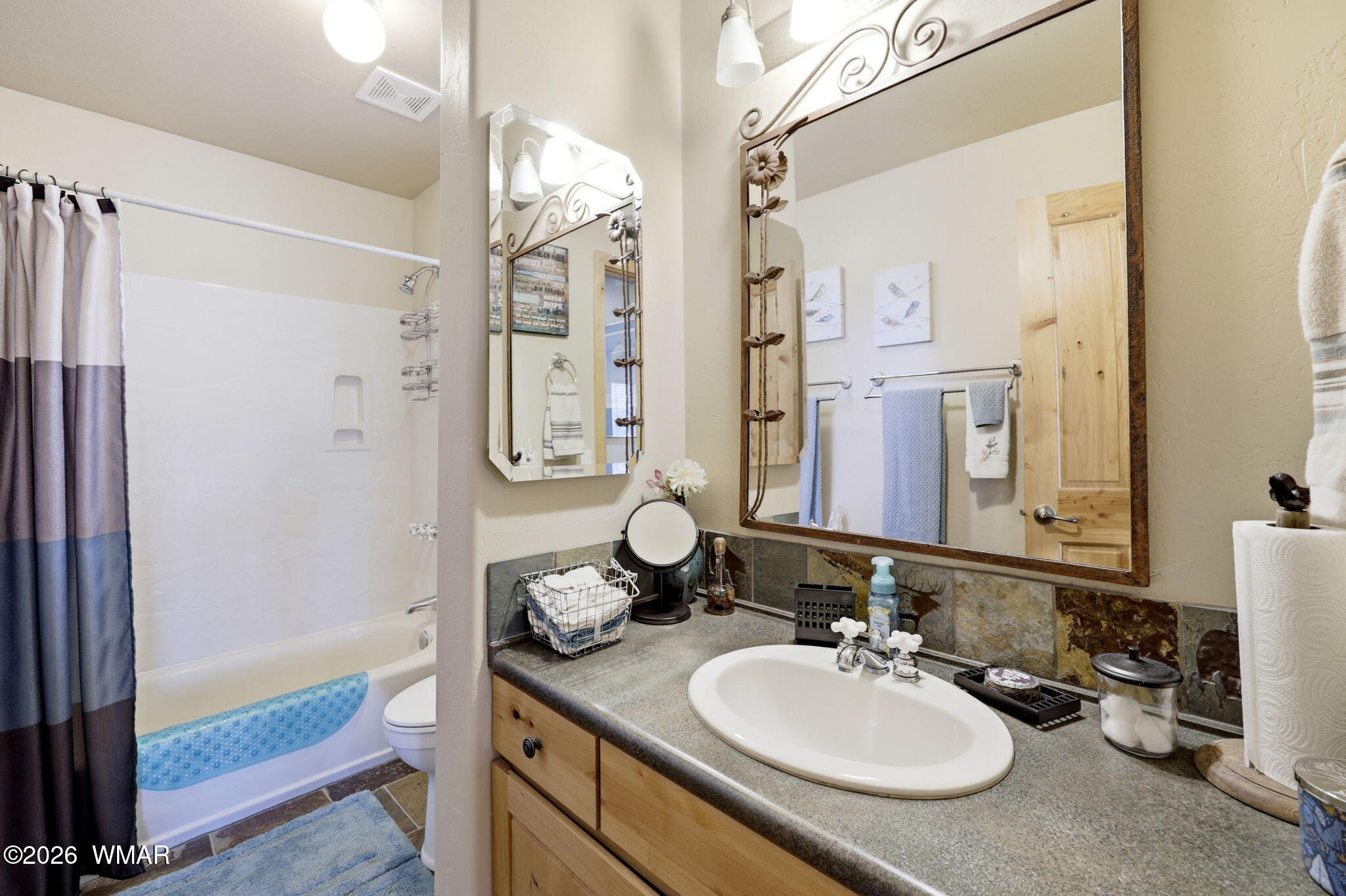2337 Puma Circle Overgaard, AZ 85933 - Photo 15 of 35 a bathroom with a sink double vanity and a mirror