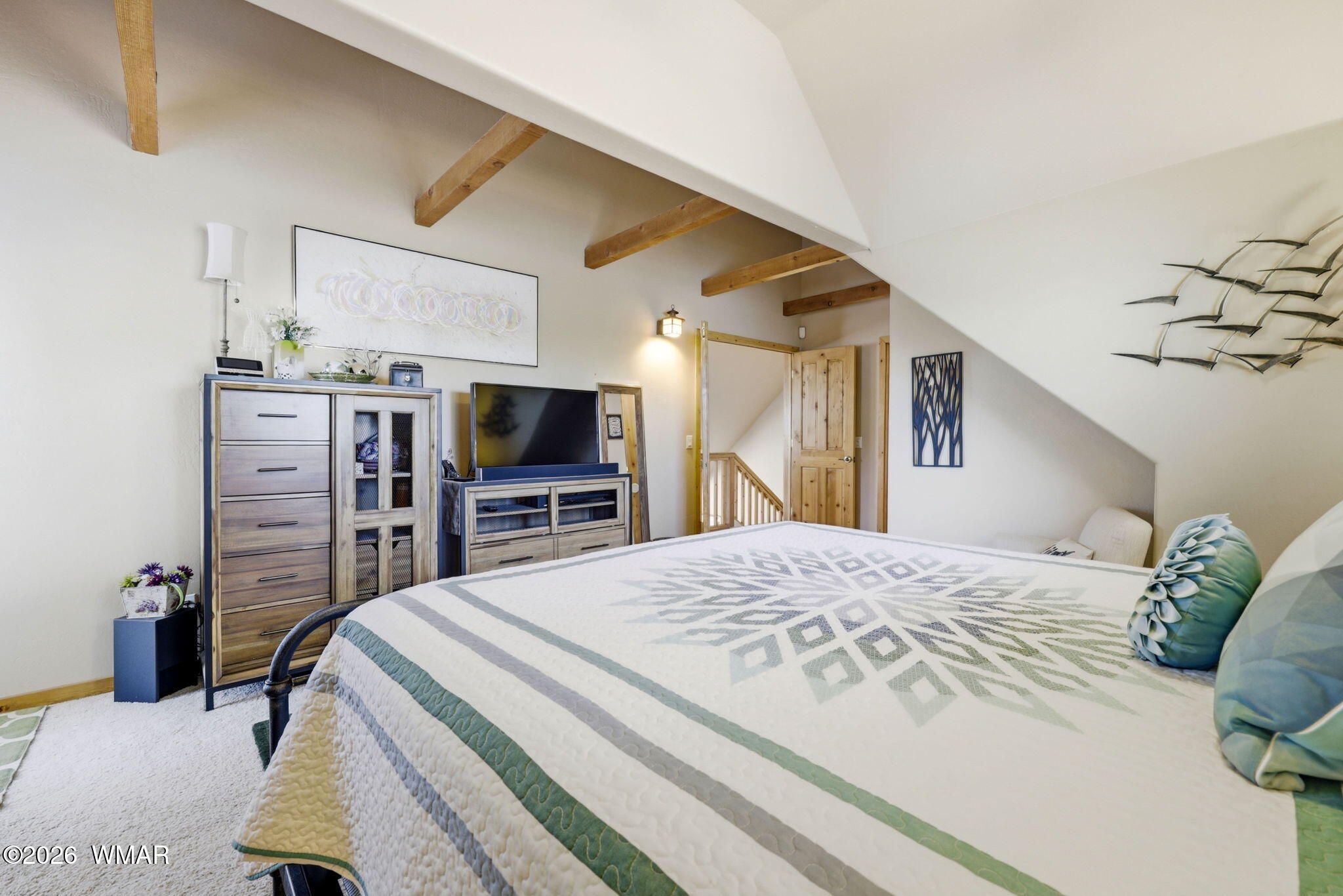 2337 Puma Circle Overgaard, AZ 85933 - Photo 20 of 35 a bedroom with a bed and a television