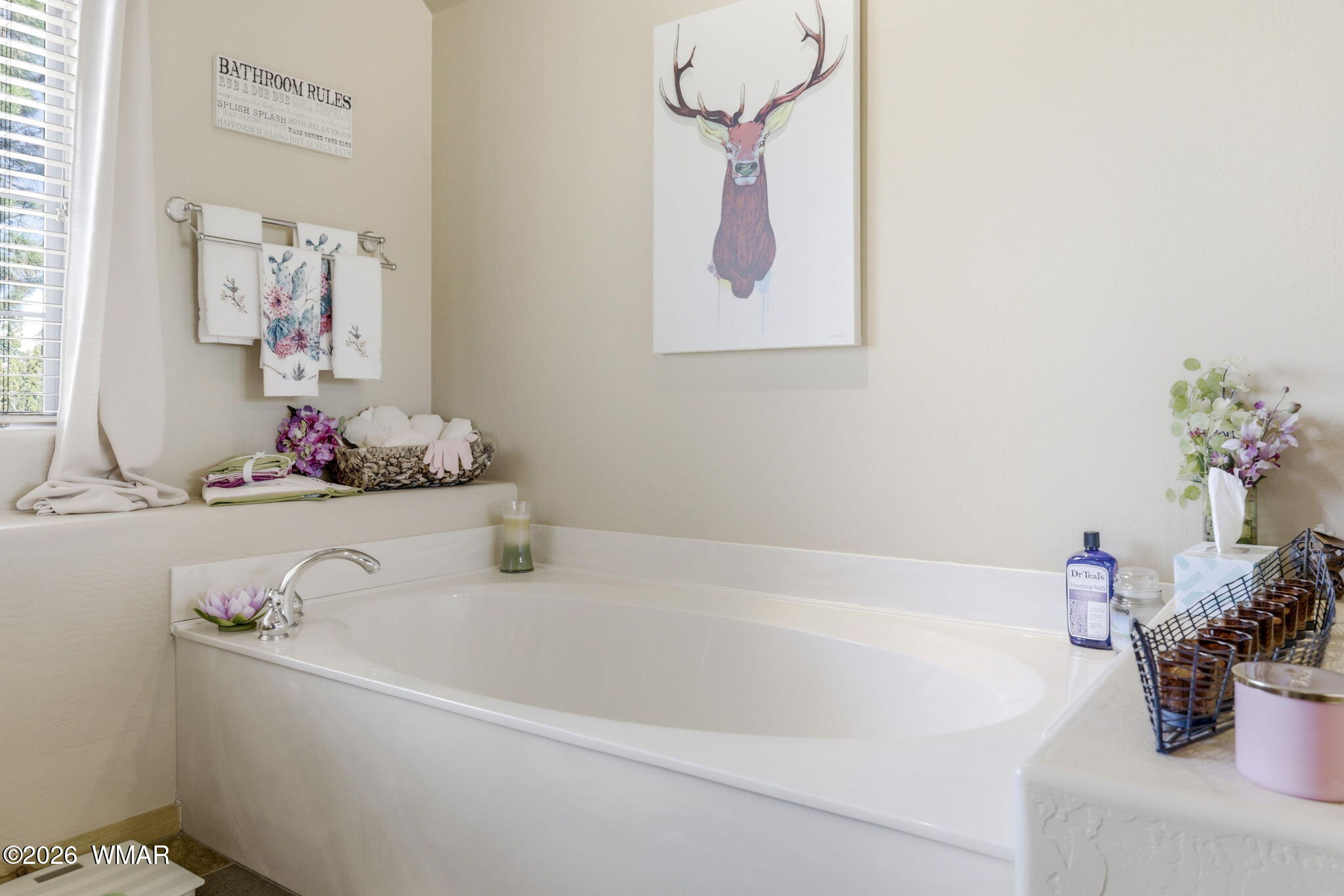 2337 Puma Circle Overgaard, AZ 85933 - Photo 23 of 35 a bathroom with a tub sink and mirror