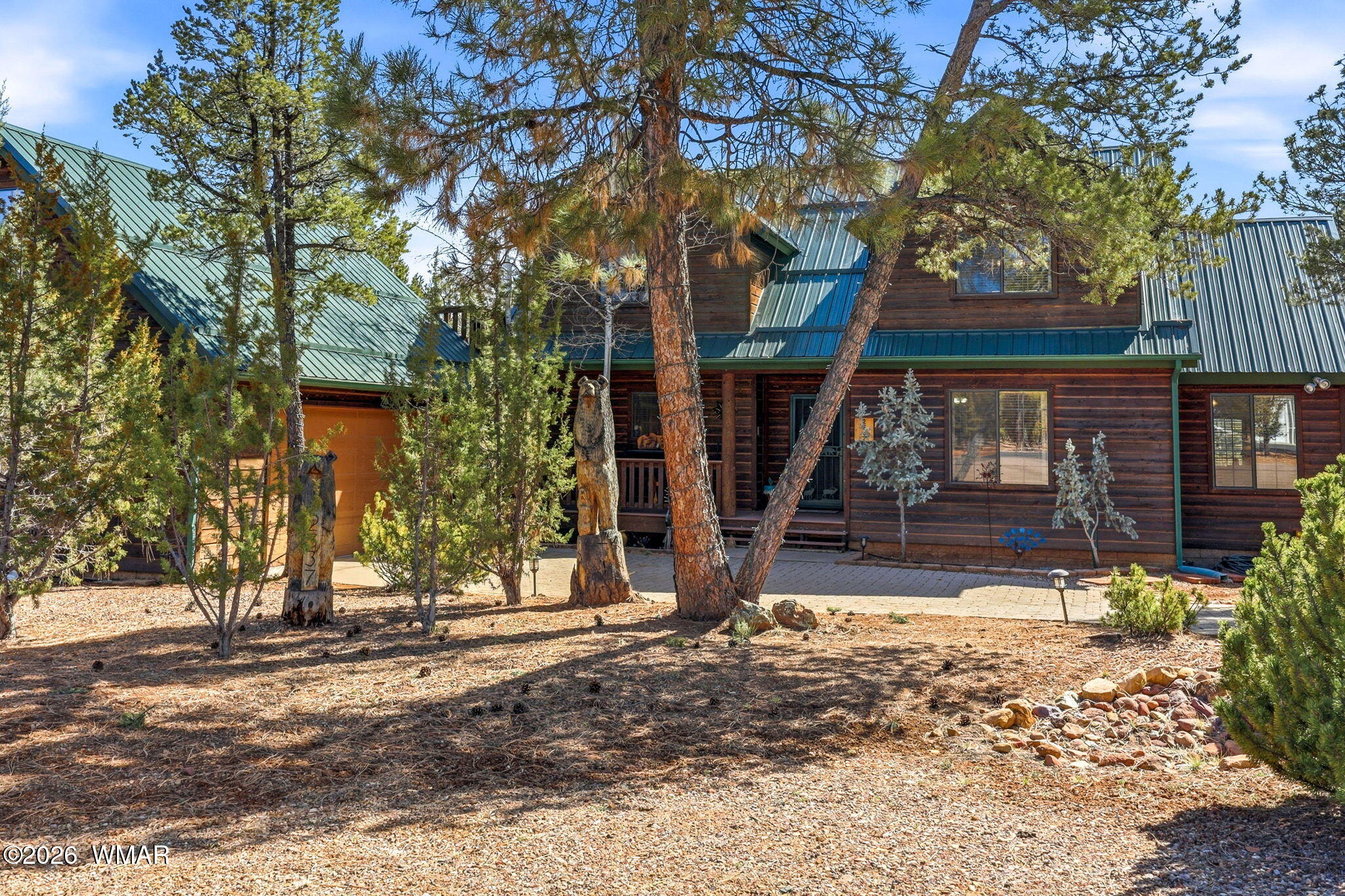 2337 Puma Circle Overgaard, AZ 85933 - Photo 4 of 35 a view of a house with tree s