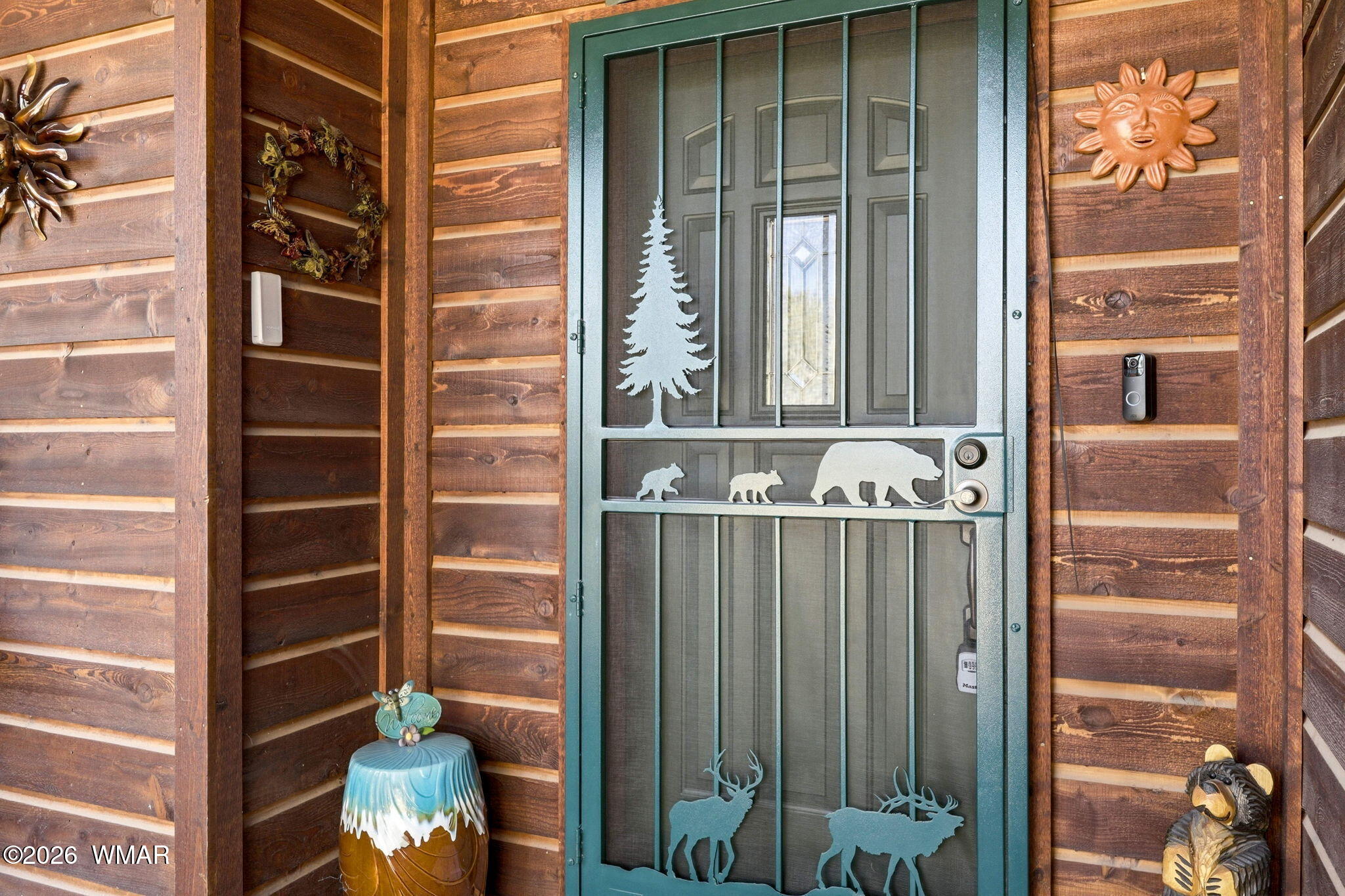 2337 Puma Circle Overgaard, AZ 85933 - Photo 6 of 35 a front view of a building with a glass door