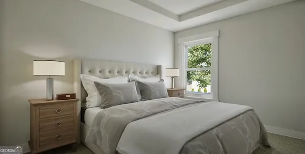 a bedroom with a bed and a night stand