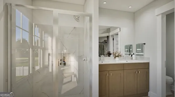 a bathroom with a sink a mirror and shower