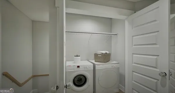 a utility room with dryer and washer