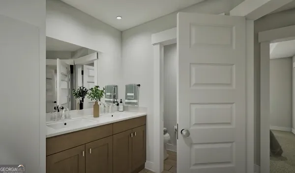 a bathroom with a shower sink and mirror