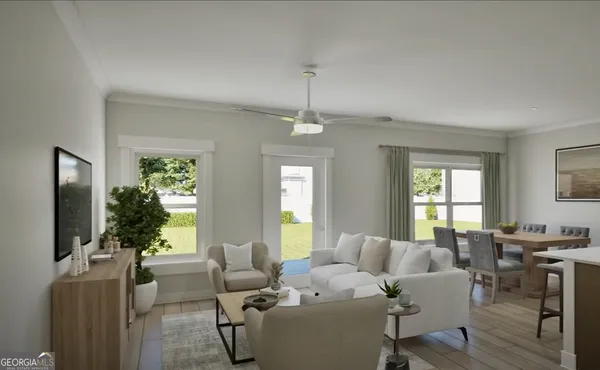 a living room with furniture a large window and a flat screen tv
