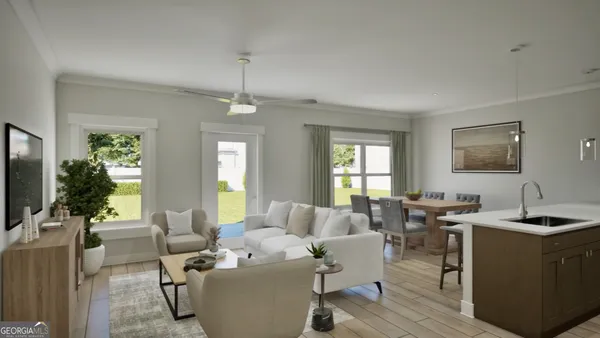 a living room with furniture and a flat screen tv