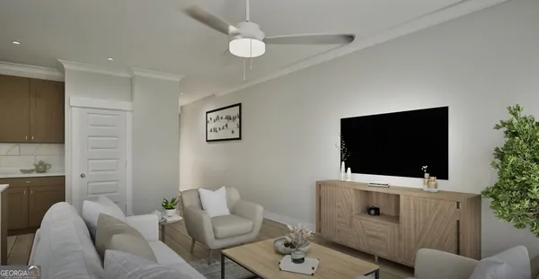 a living room with furniture and a flat screen tv