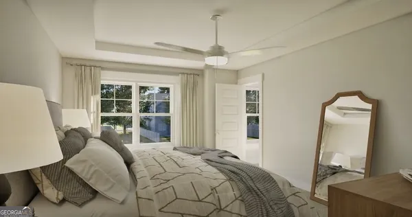 a bed room with a bed window and mirror