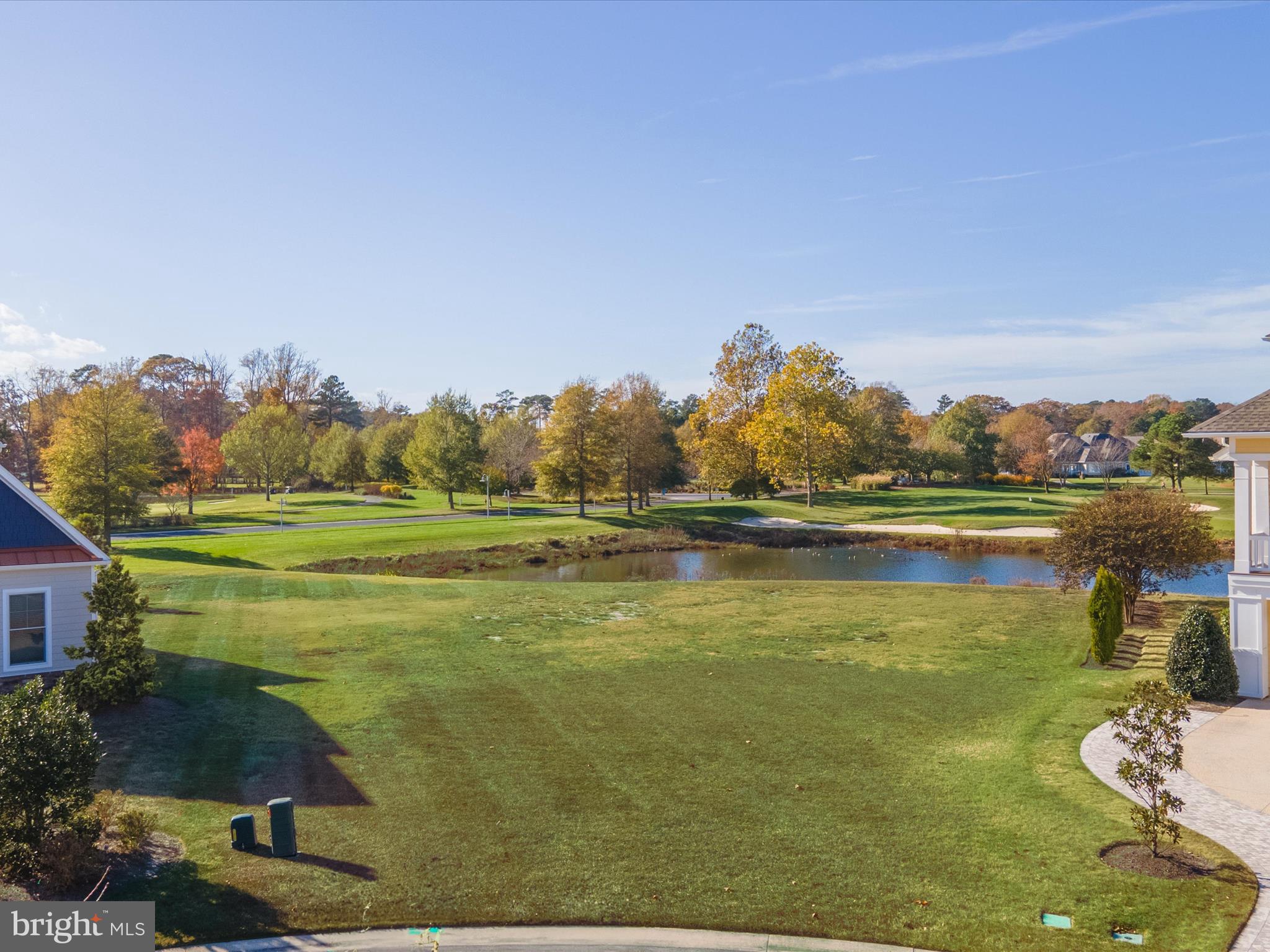 33473 Islander Drive Millsboro, DE 19966 - Photo 4 of 10 a view of a lake with houses