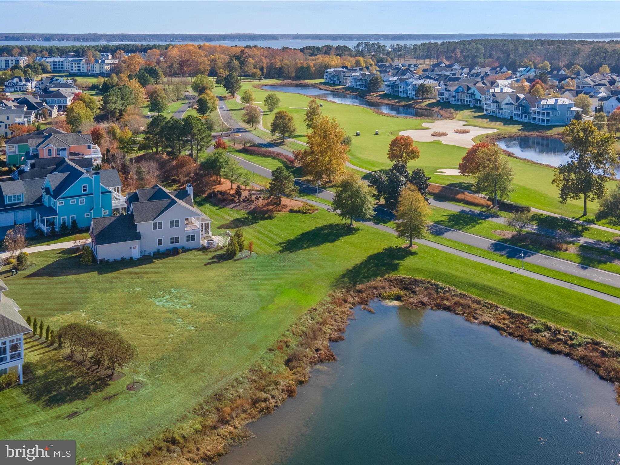 33473 Islander Drive Millsboro, DE 19966 - Photo 9 of 10 an aerial view of a houses with outdoor space and swimming pool