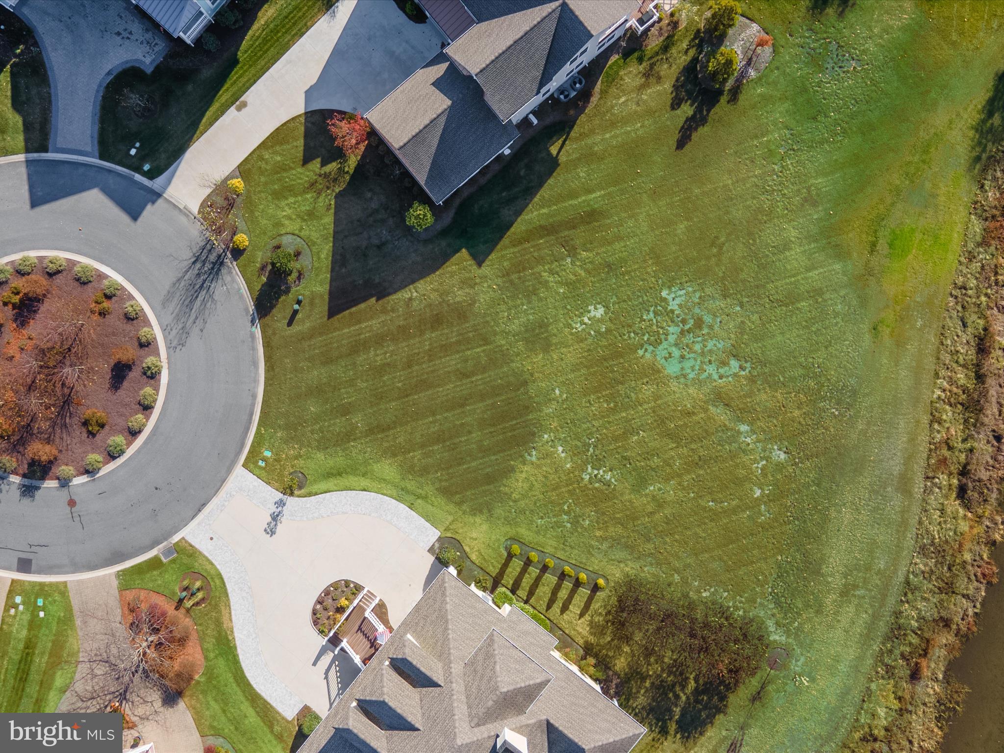 33473 Islander Drive Millsboro, DE 19966 - Photo 10 of 10 a view of swimming pool from a balcony