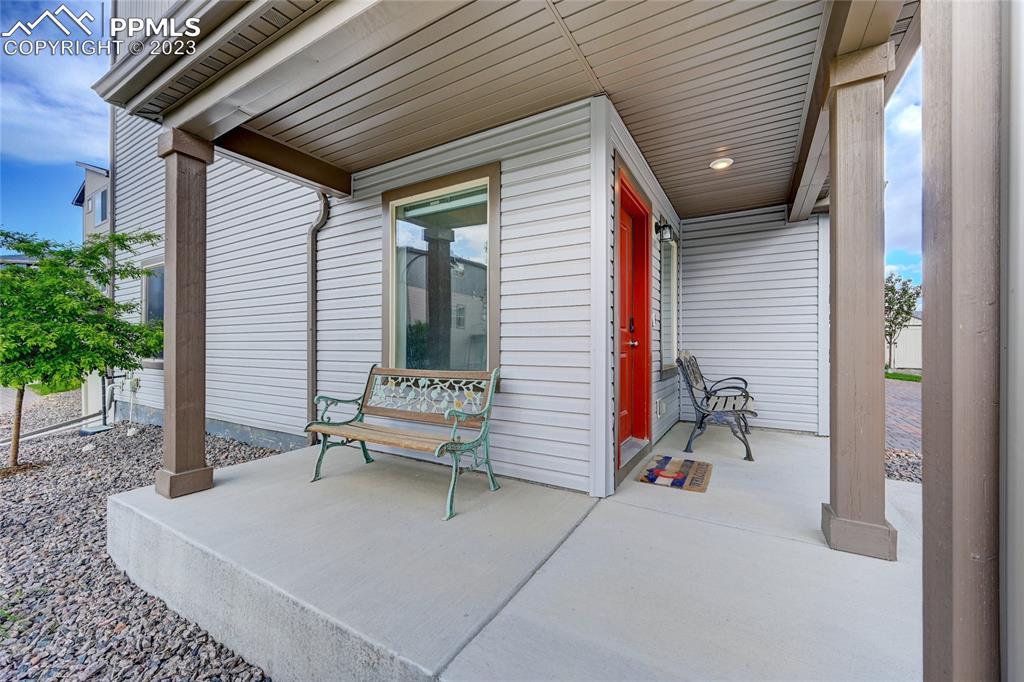 9642 Timberlake Loop Colorado Springs, CO 80927 - Photo 4 of 46 a backyard of a house with table and chairs