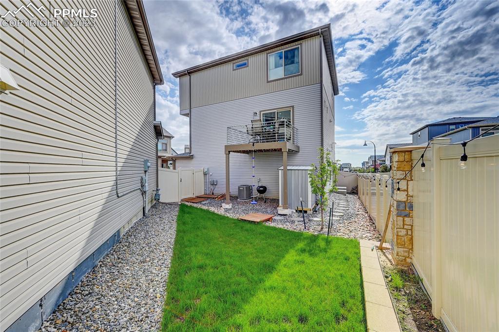 9642 Timberlake Loop Colorado Springs, CO 80927 - Photo 44 of 46 a view of a patio with a table and chairs