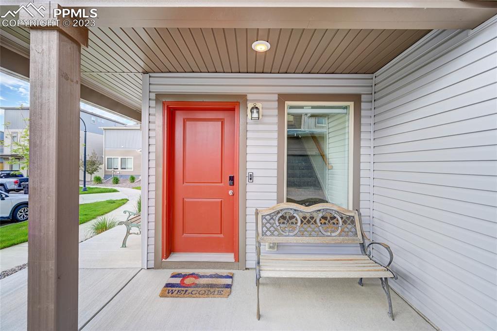 9642 Timberlake Loop Colorado Springs, CO 80927 - Photo 5 of 46 a view of a door and chair in front of the house