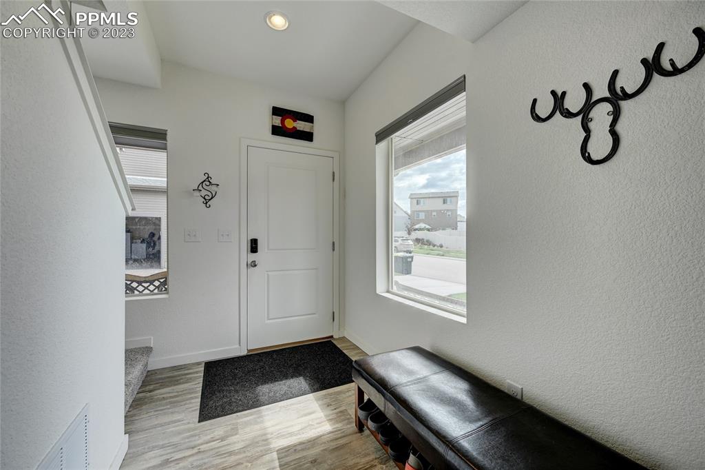 9642 Timberlake Loop Colorado Springs, CO 80927 - Photo 7 of 46 a bedroom with a bed and a window