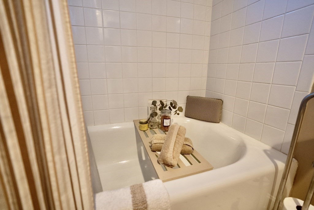 56 Bellows Circle Abington, MA 02351 - Photo 27 of 42 a bathroom with a bathtub