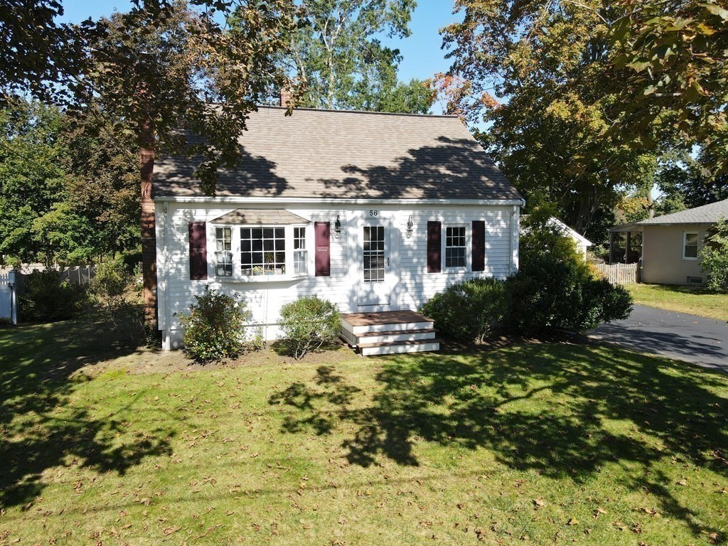 56 Bellows Circle Abington, MA 02351 - Photo 35 of 42 a front view of a house with a yard