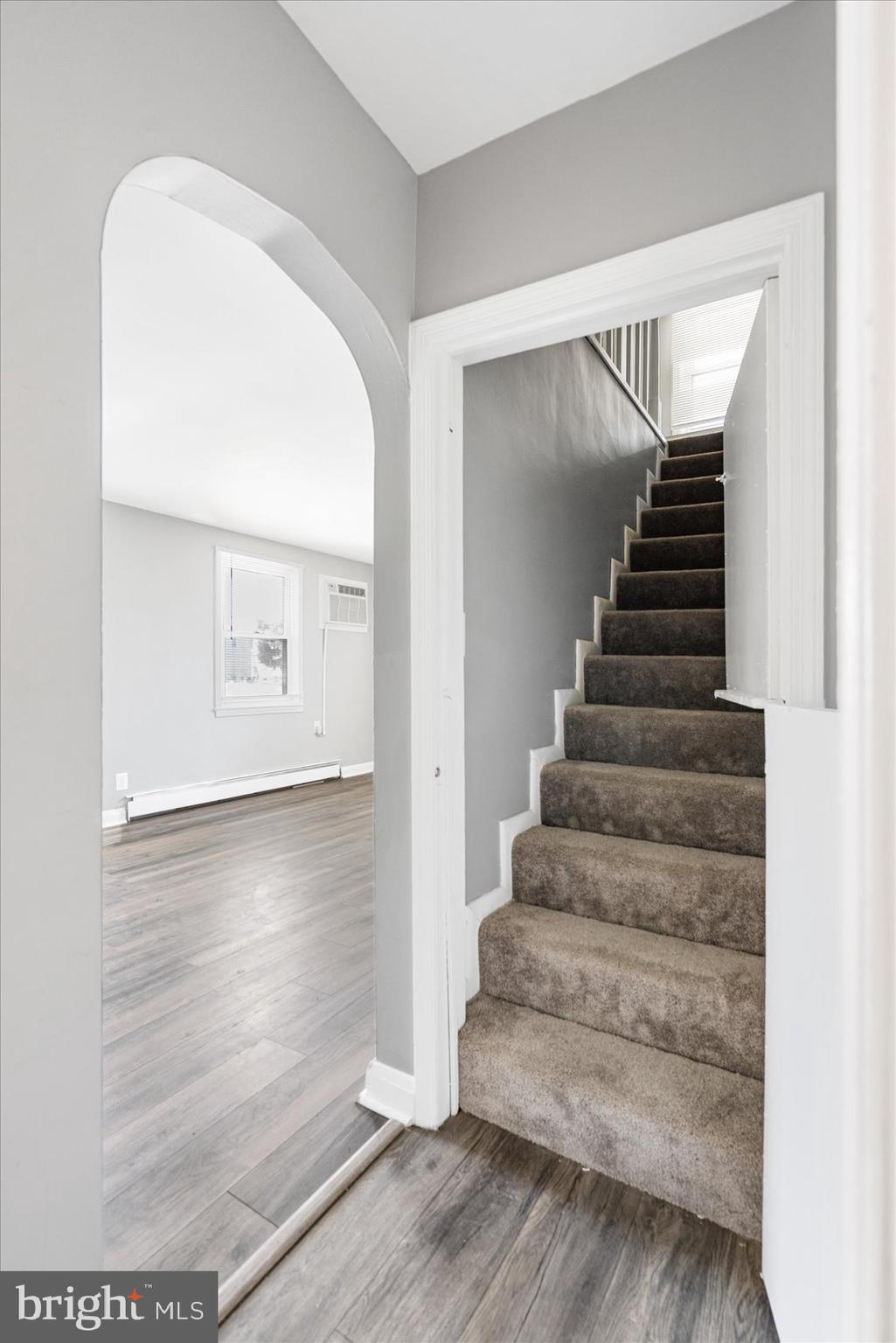 303 Miles Road Essex, MD 21221 - Photo 28 of 37 a view of entryway and hall with wooden floor