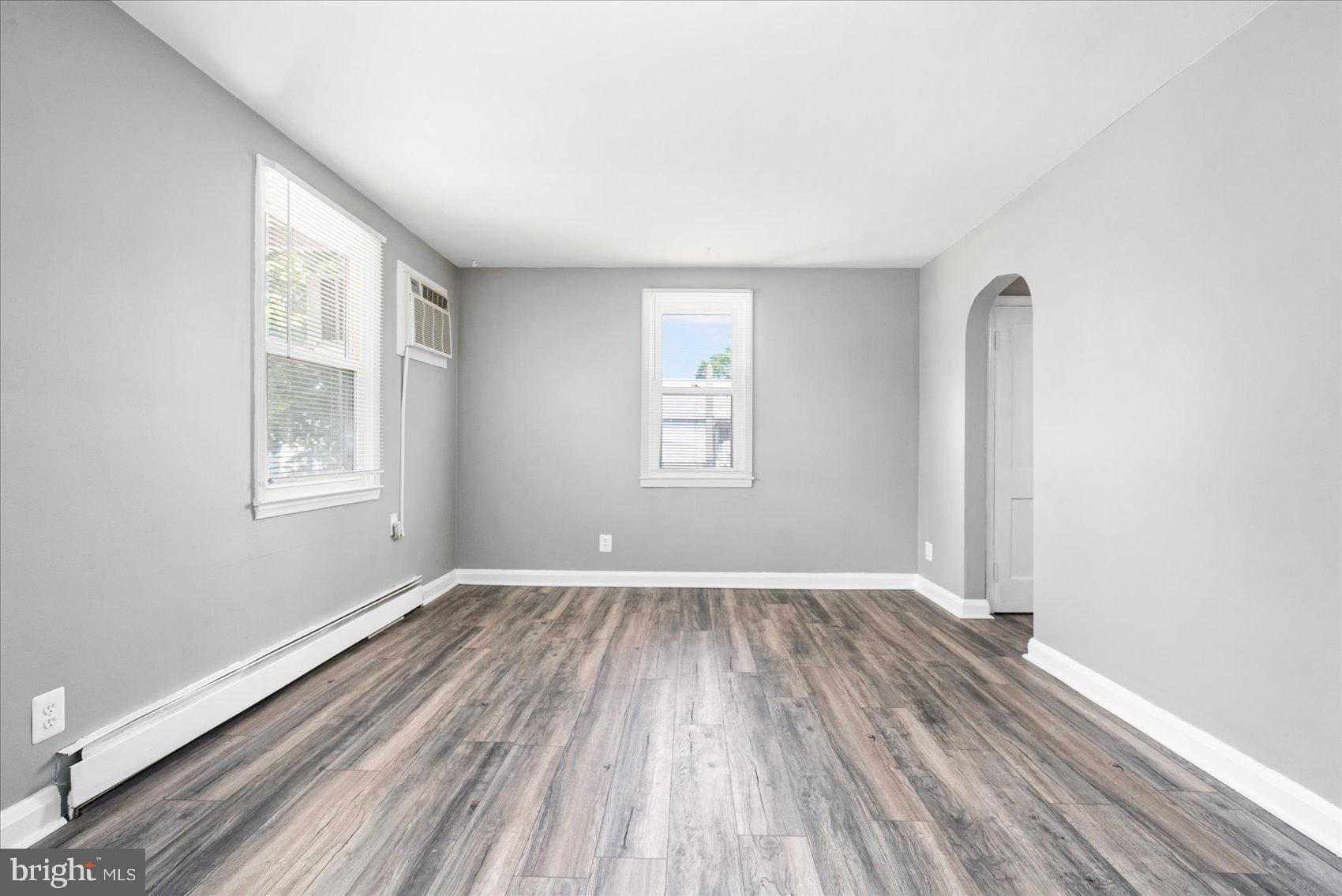 303 Miles Road Essex, MD 21221 - Photo 7 of 37 an empty room with windows